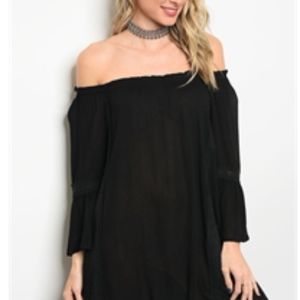 Beautiful lace trim and Flute sleeve mini dress